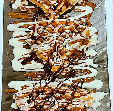 Tree waffle drizzled with chocolate and white chocolate